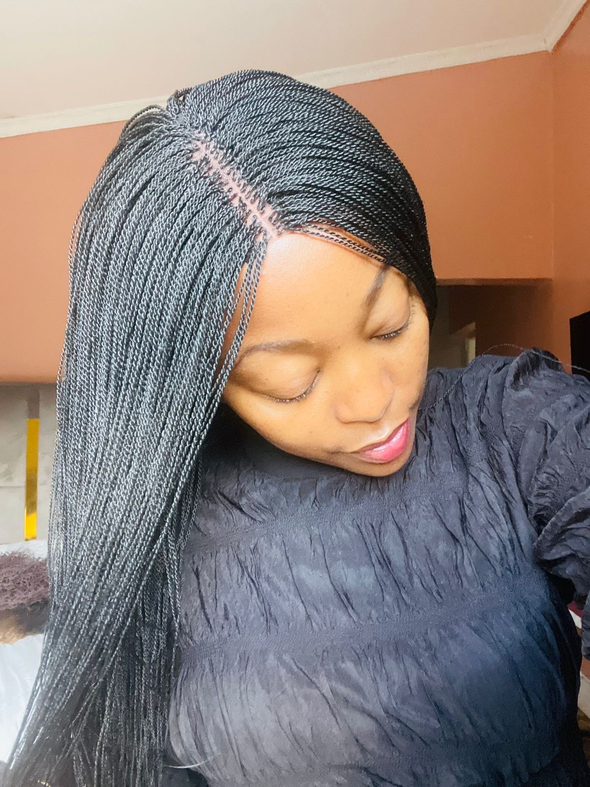Jet black braided wig